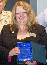 Debra with the Special Award for Valued Service to Eductaion